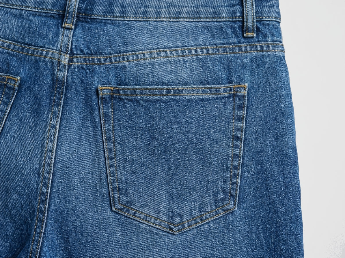 DISTRICT 99 Core Blue Straight Jeans, back detail showing the rear waistband and back pocket stitching.